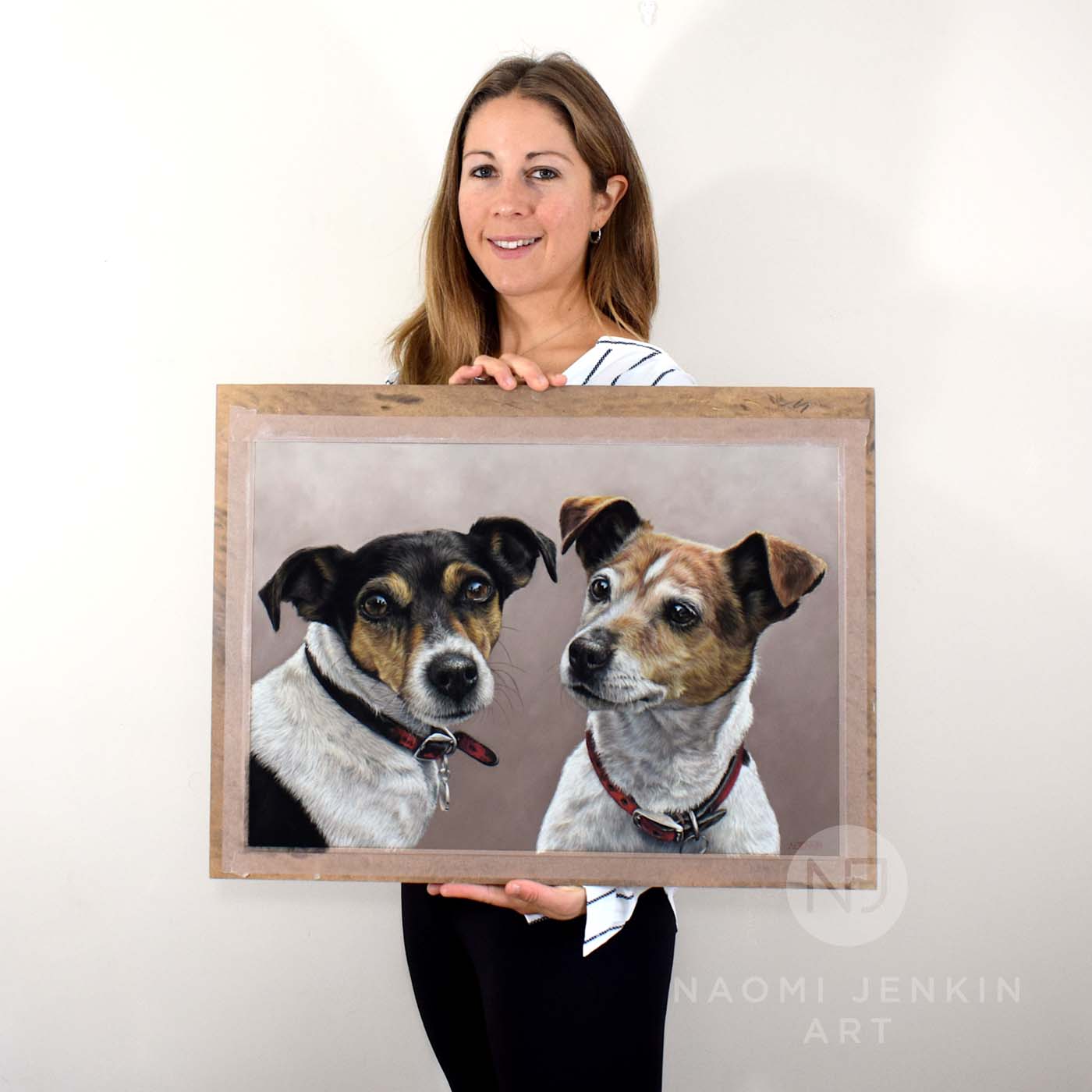 Naomi with portrait of Jack Russells, Margot and Nella