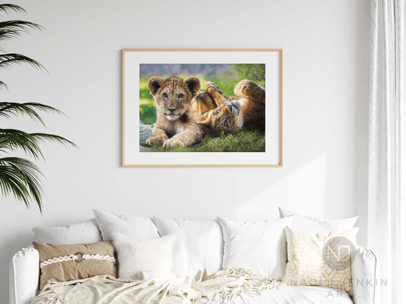 Framed fine art print of a lion painting by British wildlife artist Naomi Jenkin.